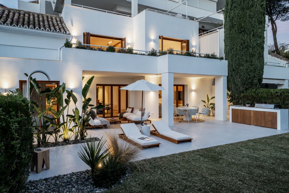 Scandinavian townhouse in golf valley with tranquil garden.
