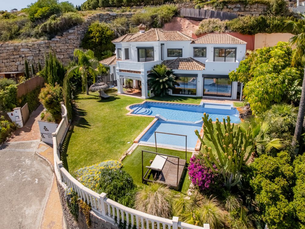 Luxurious modern villa with pool, gym, sea views.