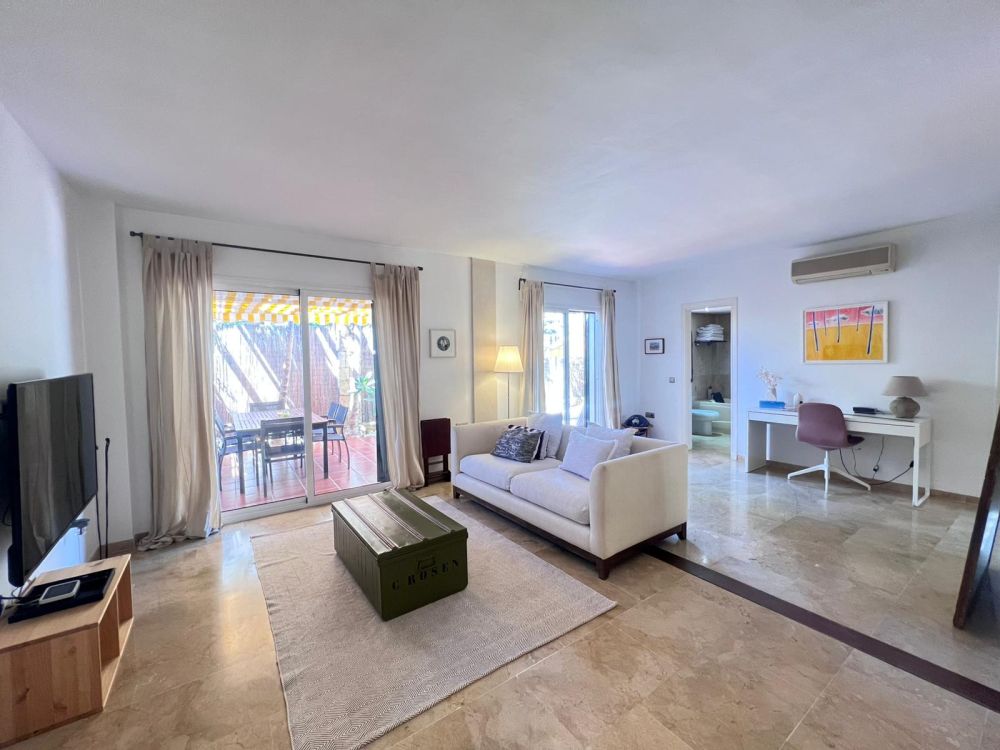 Elegant Marbella apartment with terrace and modern bathroom.