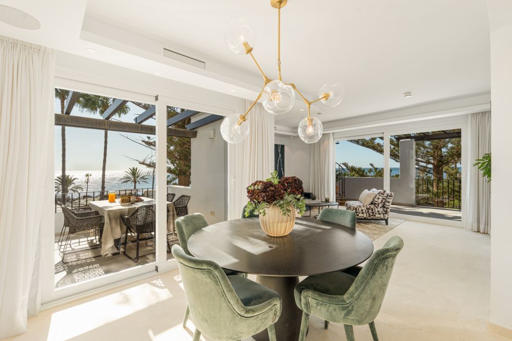 Exclusive penthouse for sale in San Pedro with sea view, steps from the shoreline.